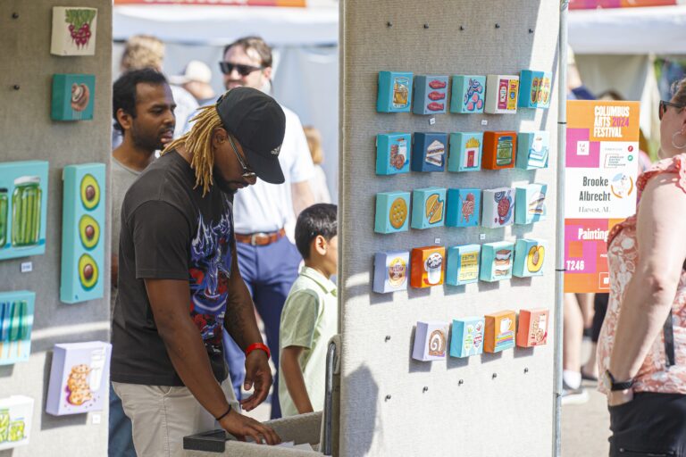 Guests shopping for art at the Festival