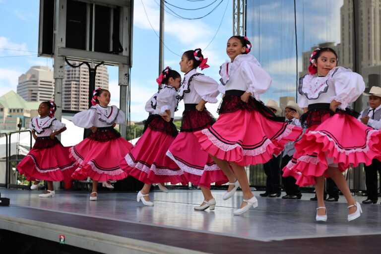 Dancers on the Genoa Park Main Stage